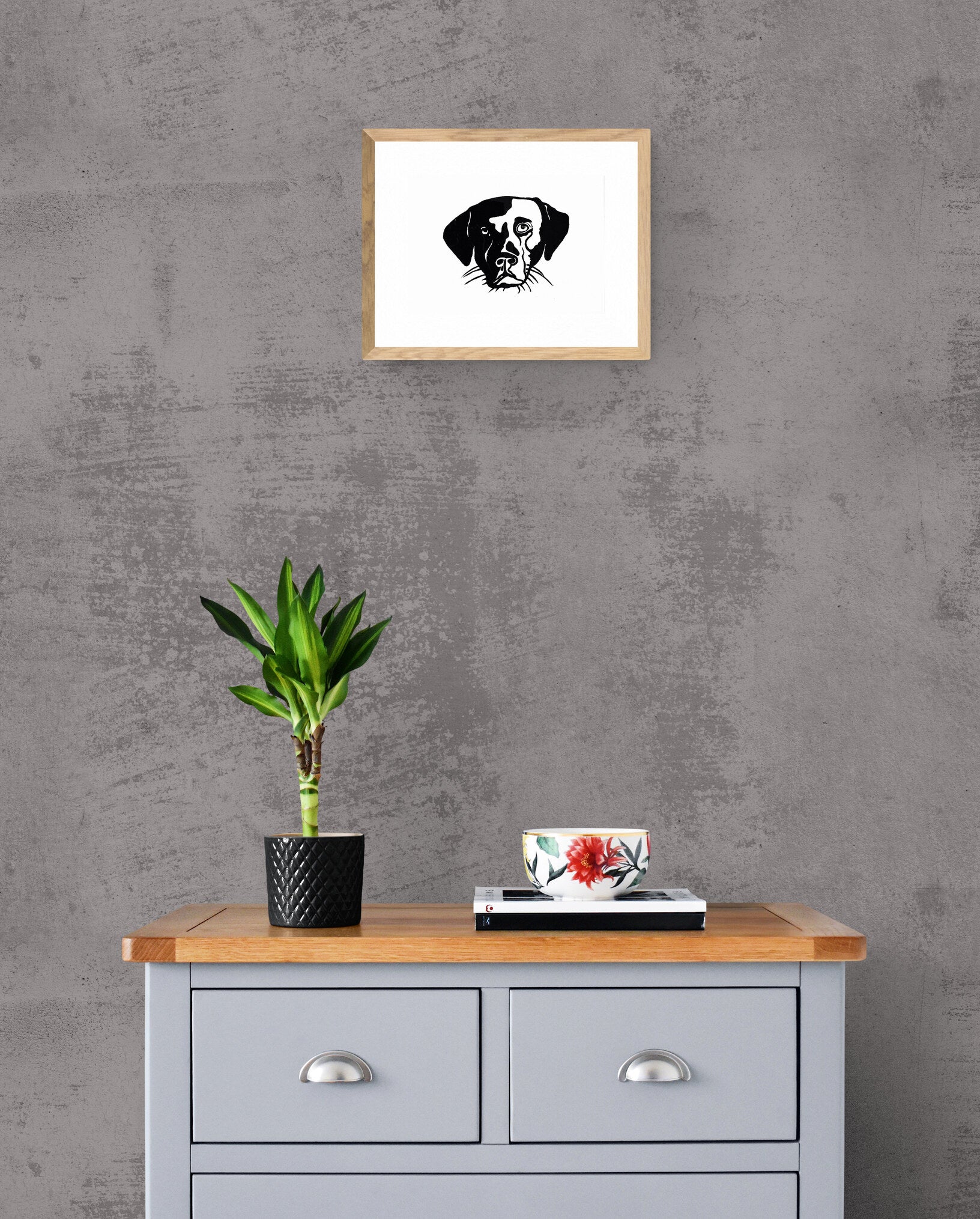 the-grey-wood-cabinet with framed picture
